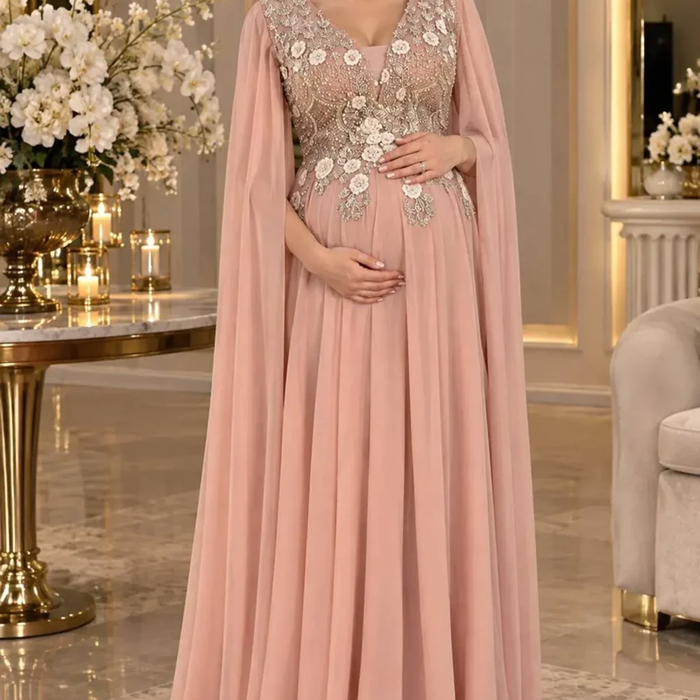 NAQWA FASHION فستان حوامل زهري راقي بكلفة تطريز فاخرة على الصدر